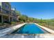Refreshing in-ground pool with stone surround, perfect for enjoying the outdoors at 20 Rivercreek Xing, Kingston, GA 30145