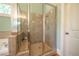 Bathroom showcasing a glass-enclosed shower with tiled walls and modern fixtures at 20 Rivercreek Xing, Kingston, GA 30145