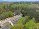 An aerial view shows the community's setting amidst lush greenery and convenient parking at 3355 Waldrop Trl, Decatur, GA 30034