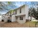 Back exterior shot of white townhomes with a patio, siding, and windows at 3355 Waldrop Trl, Decatur, GA 30034