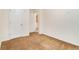 Bedroom with neutral walls, two white doors and plush brown carpeting at 3355 Waldrop Trl, Decatur, GA 30034