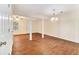 Open-concept living area with wood-look floors, recessed lighting, and easy access to other rooms at 3355 Waldrop Trl, Decatur, GA 30034