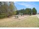 Community playground featuring slides and benches surrounded by green space, ideal for Gathering recreation at 3355 Waldrop Trl, Decatur, GA 30034