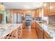 Stylish kitchen with stainless steel appliances, granite countertops, and ample cabinet space, perfect for cooking at 5 Colonial Club Se Dr, Acworth, GA 30102