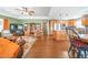 Open living area with hardwood floors, tray ceiling, and seamless flow into the kitchen at 5 Colonial Club Se Dr, Acworth, GA 30102