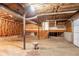 Open basement space ready for renovation, featuring high ceilings and exposed utilities at 3094 Calumet Nw Cir, Kennesaw, GA 30152