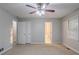 Large bedroom with ceiling fan, a closet, and neutral paint is move-in ready at 3094 Calumet Nw Cir, Kennesaw, GA 30152