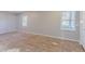 Bedroom presents the flooring renovation with dual windows offering natural light at 3094 Calumet Nw Cir, Kennesaw, GA 30152