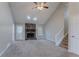 Spacious living room with vaulted ceiling, stone fireplace, and natural light at 3094 Calumet Nw Cir, Kennesaw, GA 30152