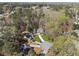 Overhead shot showcases the home's location within a lush, wooded neighborhood, highlighting its serene setting at 3823 Briarstone Cv, Snellville, GA 30039