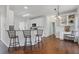 Charming kitchen with breakfast bar, stainless appliances, and built-in desk at 3823 Briarstone Cv, Snellville, GA 30039