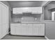 Basement area featuring cabinets, countertop and sink with plenty of storage space at 4005 Saddlebrook Creek Dr, Marietta, GA 30060