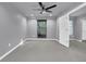 Spacious bedroom features a ceiling fan, window, and neutral paint for easy customization at 4005 Saddlebrook Creek Dr, Marietta, GA 30060