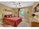 Cozy bedroom with warm tones, a ceiling fan, and ample natural light at 4005 Saddlebrook Creek Dr, Marietta, GA 30060
