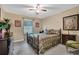 Bedroom with neutral walls, ceiling fan and traditional furnishings at 4005 Saddlebrook Creek Dr, Marietta, GA 30060