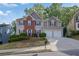 Charming two-story home featuring a brick facade and a two-car garage at 4005 Saddlebrook Creek Dr, Marietta, GA 30060