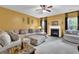Spacious living room with a fireplace, plush sectional and natural light at 4005 Saddlebrook Creek Dr, Marietta, GA 30060