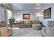 Cozy living room with neutral color walls, plush sofa and carpet at 4005 Saddlebrook Creek Dr, Marietta, GA 30060