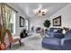 Bright living room with neutral colors, ceiling fan, and natural light at 4005 Saddlebrook Creek Dr, Marietta, GA 30060