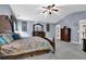 Main bedroom with vaulted ceilings and hardwood furniture at 4005 Saddlebrook Creek Dr, Marietta, GA 30060