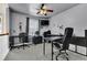 Home office with multiple desks, black furnishings, and overhead lighting at 4005 Saddlebrook Creek Dr, Marietta, GA 30060