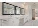 Bathroom with white marble floors, a double vanity, and a frameless shower at 7785 Wild Violet Dr, Cumming, GA 30040