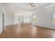 Spacious bedroom with a tray ceiling, ample natural light, and neutral color palette at 7785 Wild Violet Dr, Cumming, GA 30040