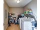 Functional laundry room with shelving, washer, and dryer at 105 Ruff Harris Dr, Dallas, GA 30157