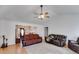 Open-concept living room with hardwood floors and seamless flow into the foyer at 105 Ruff Harris Dr, Dallas, GA 30157