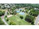 Community amenities featuring tennis courts and a basketball court surrounded by lush trees and green spaces at 302 Grant Ct, Canton, GA 30114