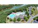 Community pool with water slide, swimming pool, kiddie pool, clubhouse, and lake at 302 Grant Ct, Canton, GA 30114