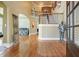 Grand foyer features gleaming hardwood floors, a staircase with iron railings, and soaring ceilings at 302 Grant Ct, Canton, GA 30114