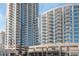 An exterior shot of a condominium building featuring modern design and expansive windows at 400 W West Peachtree Nw St, Atlanta, GA 30308
