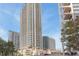 Exterior view of a modern high-rise condominium featuring balconies and stylish design at 400 W West Peachtree Nw St, Atlanta, GA 30308
