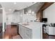 Bright kitchen features stainless appliances, modern countertops, and an open layout connecting to office at 400 W West Peachtree Nw St, Atlanta, GA 30308