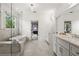 A stylish bathroom with glass shower, soaking tub, and double vanity with stone countertops at 1291 Briarwood Ne Rd, Brookhaven, GA 30319
