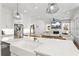 Open concept kitchen with white countertops, stainless appliances, farmhouse sink, and a large island at 1291 Briarwood Ne Rd, Brookhaven, GA 30319