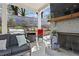 Outdoor patio area featuring built in grilling and lounge area with fireplace, perfect for outdoor entertaining at 1291 Briarwood Ne Rd, Brookhaven, GA 30319