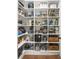 Walk-in pantry featuring custom shelving, perfect for organized storage of food and kitchen items at 1291 Briarwood Ne Rd, Brookhaven, GA 30319