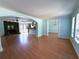 Spacious living room with hardwood floors, a fireplace, and large windows offering ample natural light at 2919 Manitoba Ln, Marietta, GA 30062