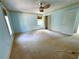 Main Bedroom featuring neutral walls, carpet, a ceiling fan, closet, and windows at 2919 Manitoba Ln, Marietta, GA 30062