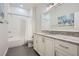 Well-lit bathroom featuring granite counters, vanity and shower with white subway tile at 555 E Wesley Ne Rd, Atlanta, GA 30305