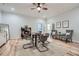 This bonus room features hardwood floors and a gaming area with a round table and 4 chairs at 555 E Wesley Ne Rd, Atlanta, GA 30305