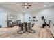 This bonus room features hardwood floors, accent chairs, and a exercise bike at 555 E Wesley Ne Rd, Atlanta, GA 30305