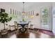 Cozy breakfast nook features built-in seating, natural light, and stylish decor at 555 E Wesley Ne Rd, Atlanta, GA 30305