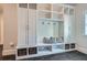 Mudroom with built-in storage, bench seating, and decorative baskets and throw pillows at 555 E Wesley Ne Rd, Atlanta, GA 30305