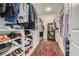 Organized walk-in closet with built-in shelving and ample storage space at 555 E Wesley Ne Rd, Atlanta, GA 30305