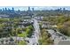 Stunning aerial view featuring the city skyline, lush greenery, and neighborhood streets at 737 Barnett Ne St # C4, Atlanta, GA 30306