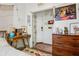 Well-lit bedroom with a vintage desk, a decorative rug, and ample storage at 737 Barnett Ne St # C4, Atlanta, GA 30306