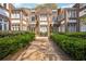 Charming brick apartment building with a well-manicured front yard and a welcoming entrance at 737 Barnett Ne St # C4, Atlanta, GA 30306